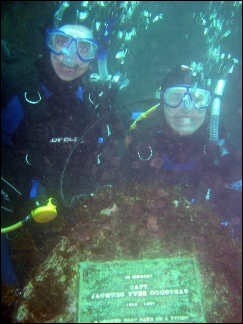 Jeremy and Priscilla in front of the Jacques Cousteau Monument